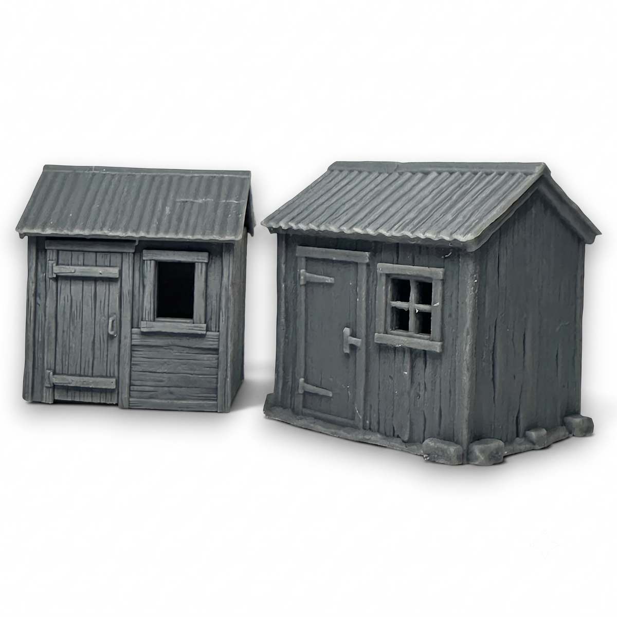 A pair of HO and OO Scale model garden shed models